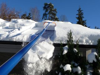 Telescopische sneeuwschraper