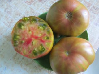 Tomato Nanas hitam: ciri dan perihalan varieti, foto